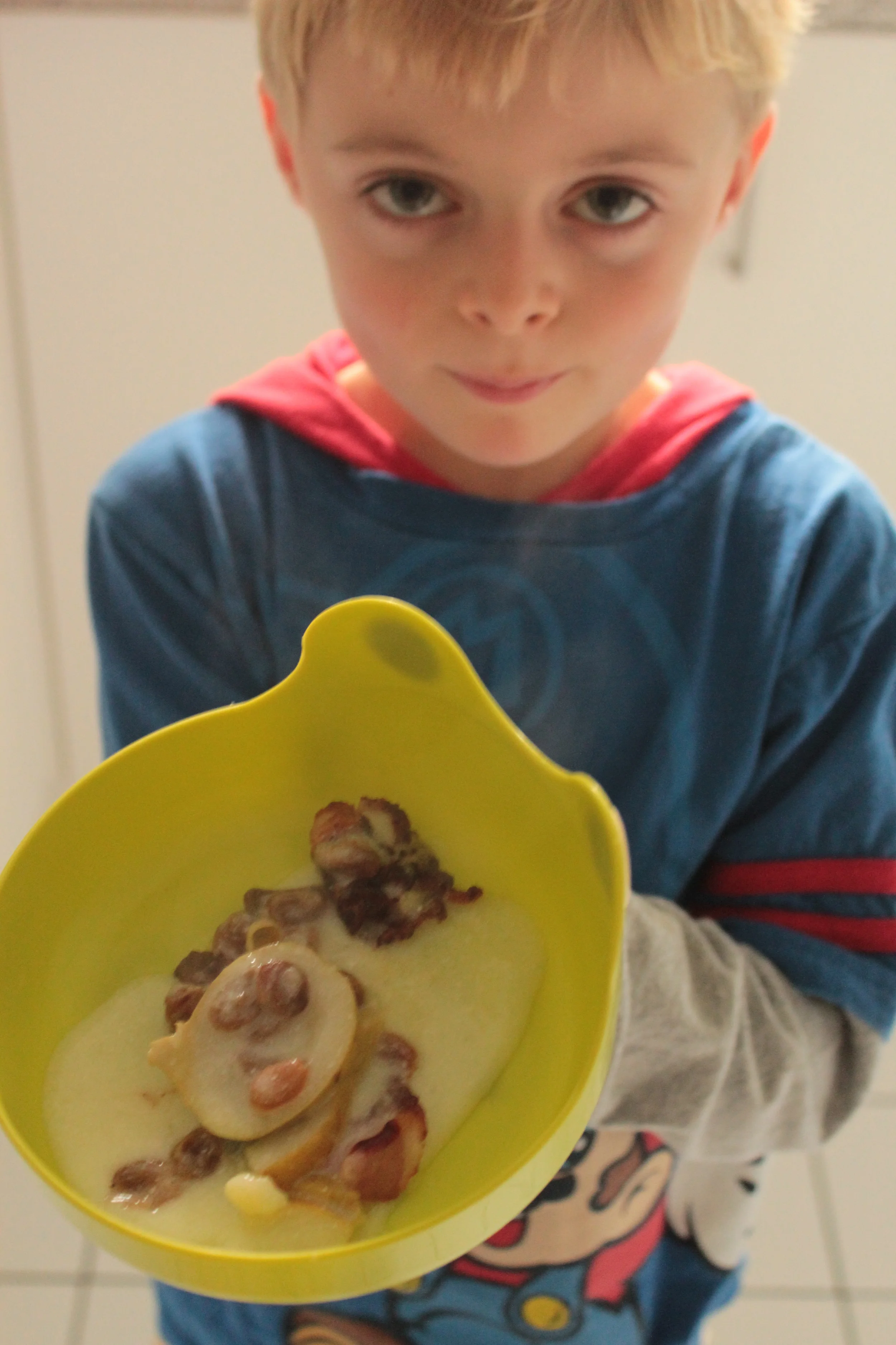 Look at the kids face- he can barely hold it:)