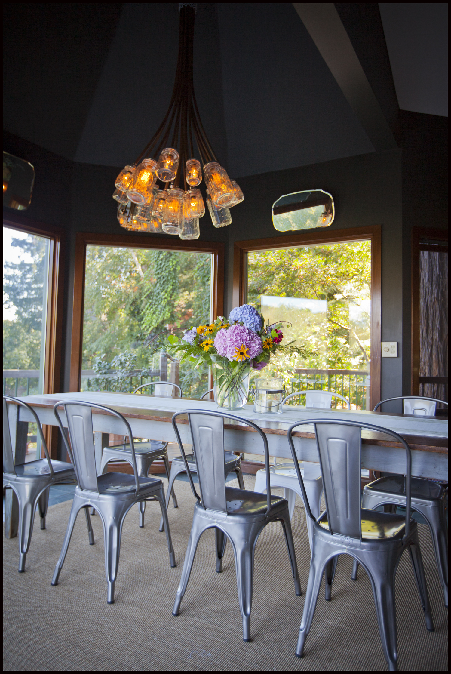 Dining area, seats 8-10, view of the garden and river.