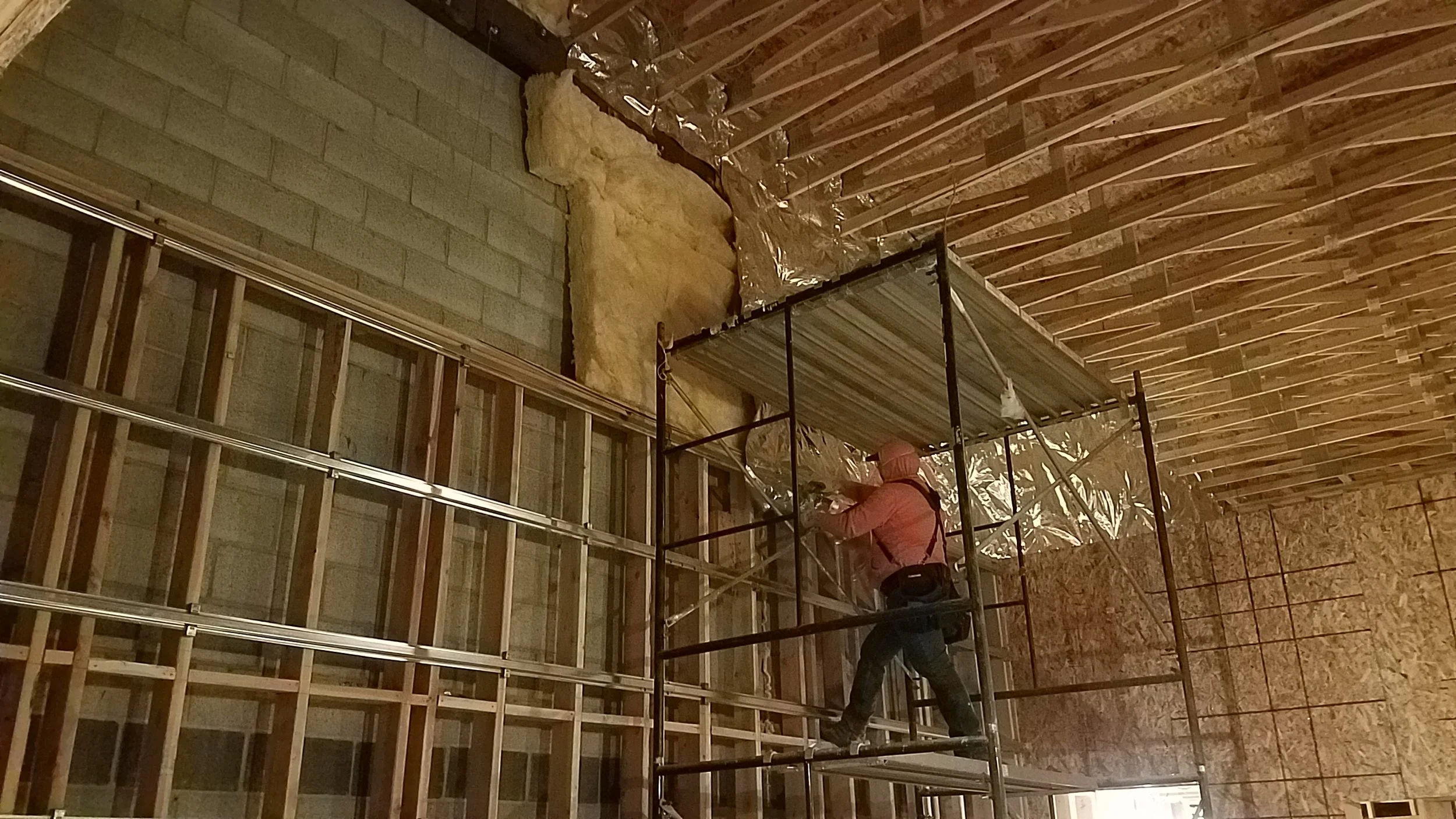 Insulation of the exterior walls continued this week, this is above studio 2.