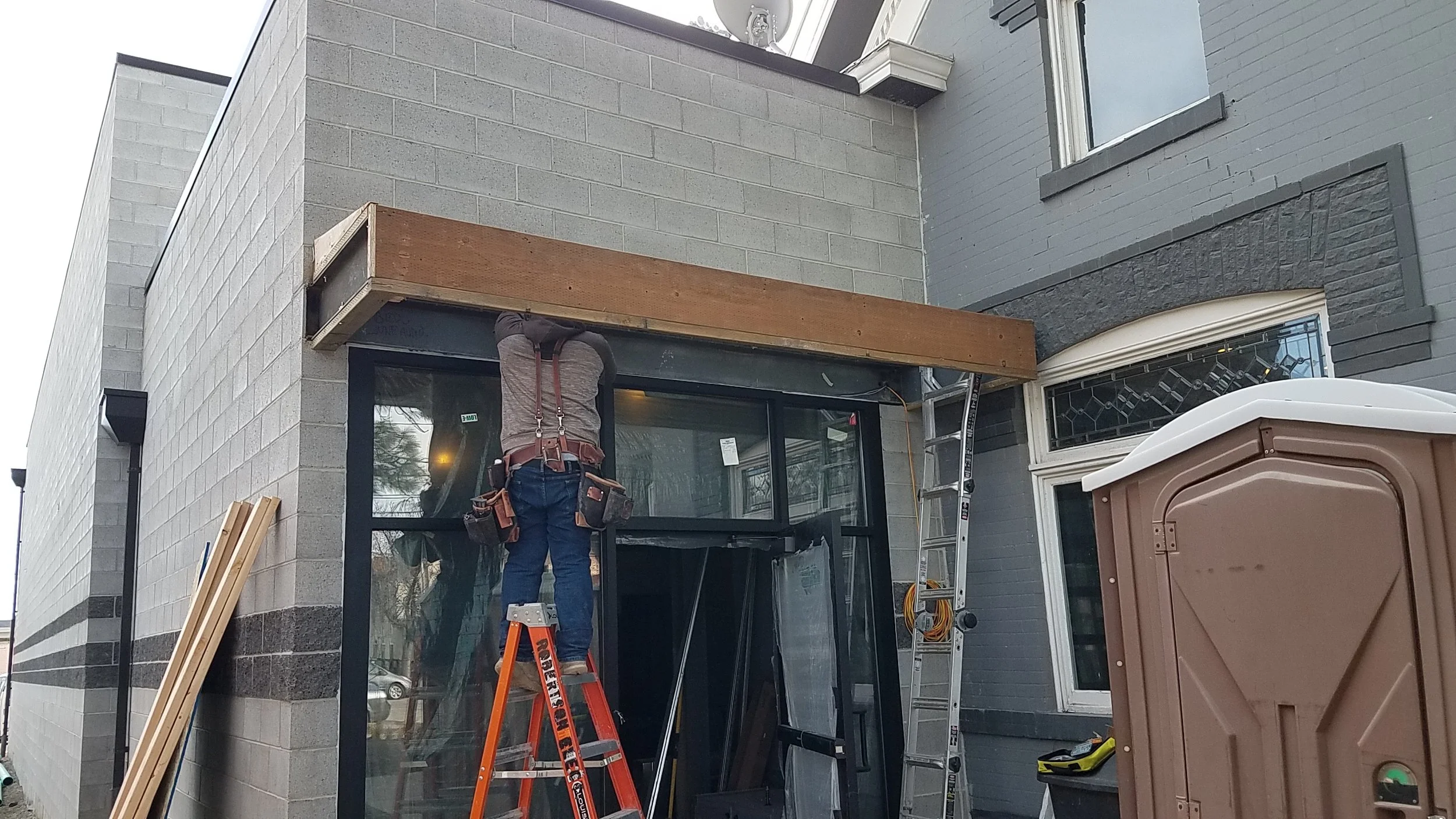 Our canopy out front was framed up this week as well.
