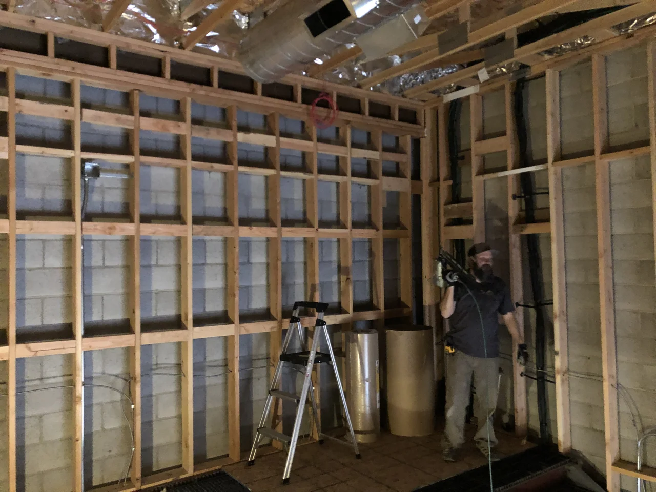 This is upstairs in the instrument gallery. The insulation company was set to arrive on Thursday so Wednesday afternoon Jared (superintendent) and I did a bunch of extra blocking to give a sturdy backing to the guitar hangers for the room.