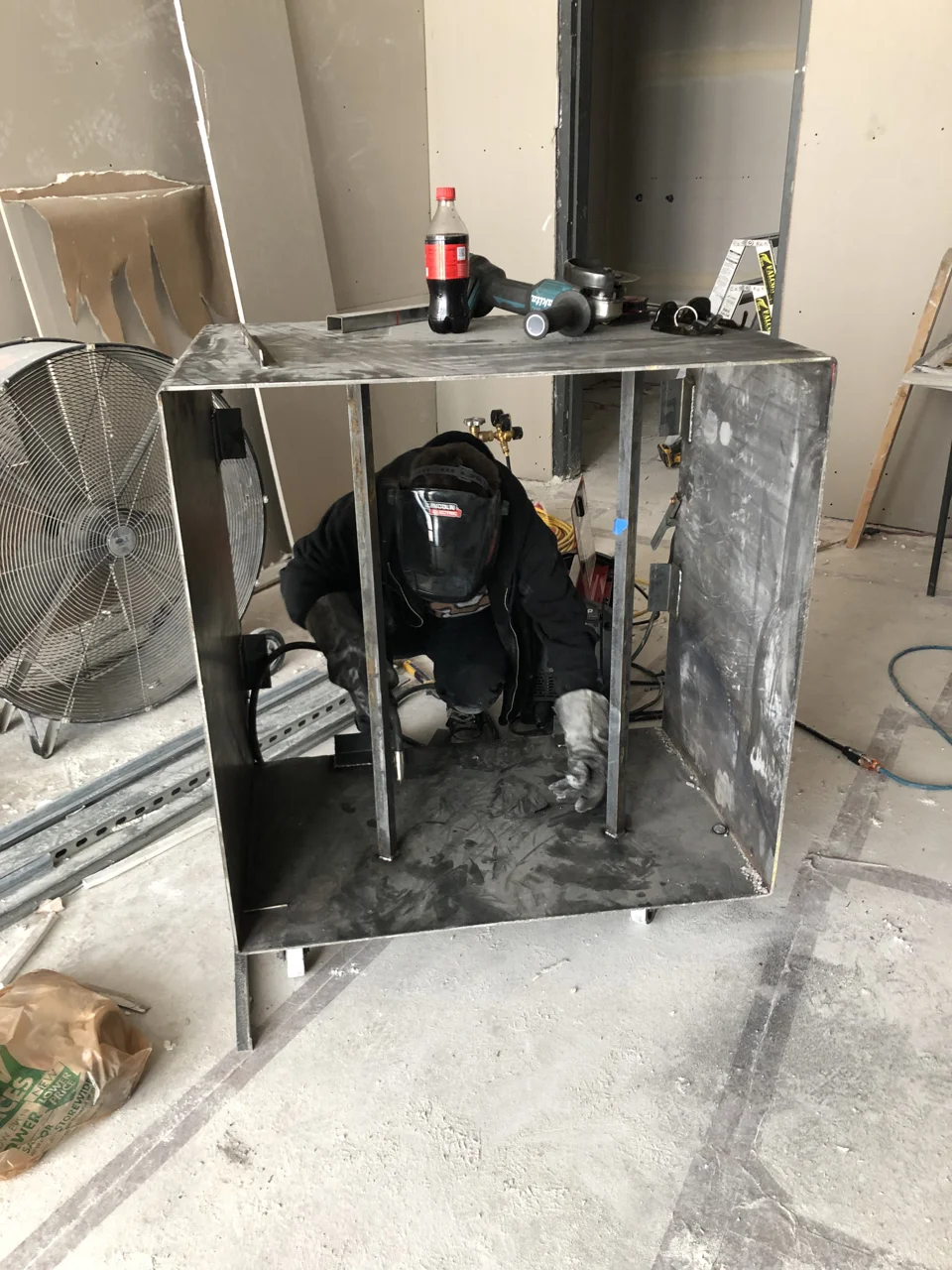 My son Brenden came back to finish the welding on the fire pit which is now ready to head off to powder coating.
