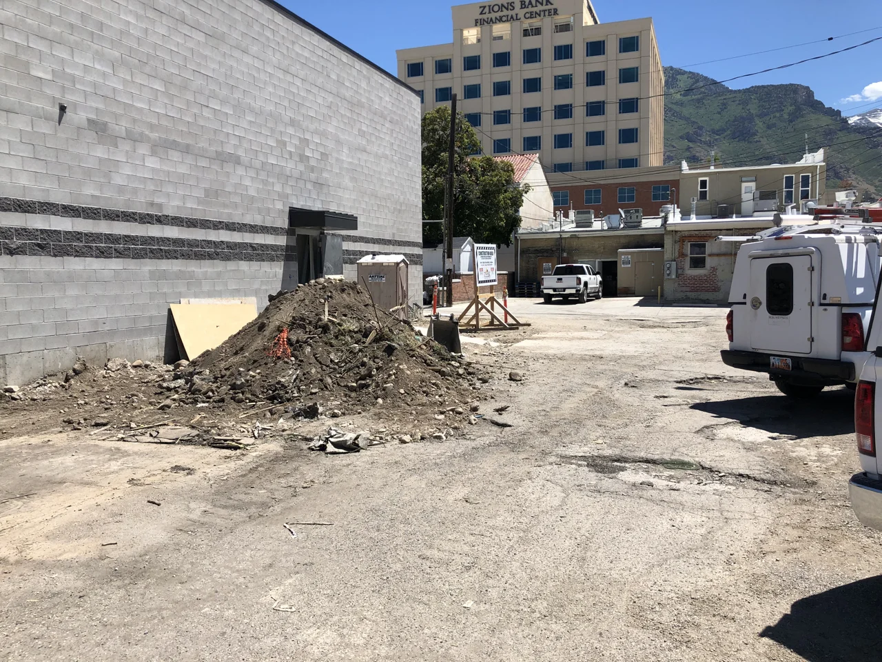 Behind the studio the excavators began preparing the alley for asphalt.