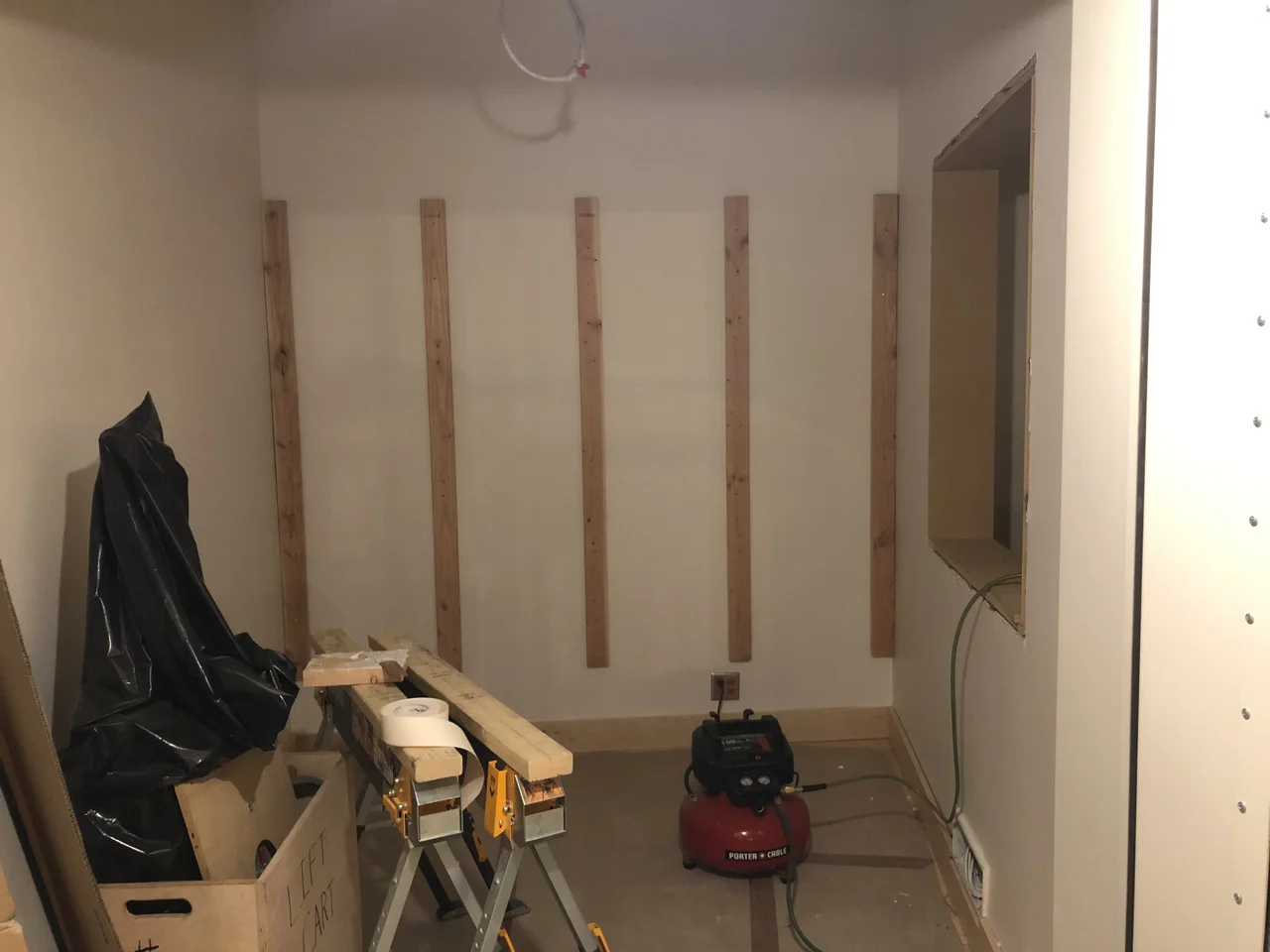 Framing for the wall treatments in studio 1 iso booths.