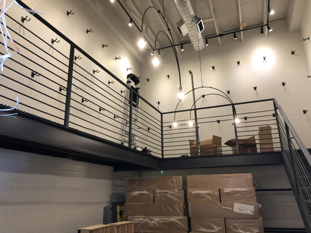 It took a while but I finally got all the guitar hangers up in the instrument storage room.