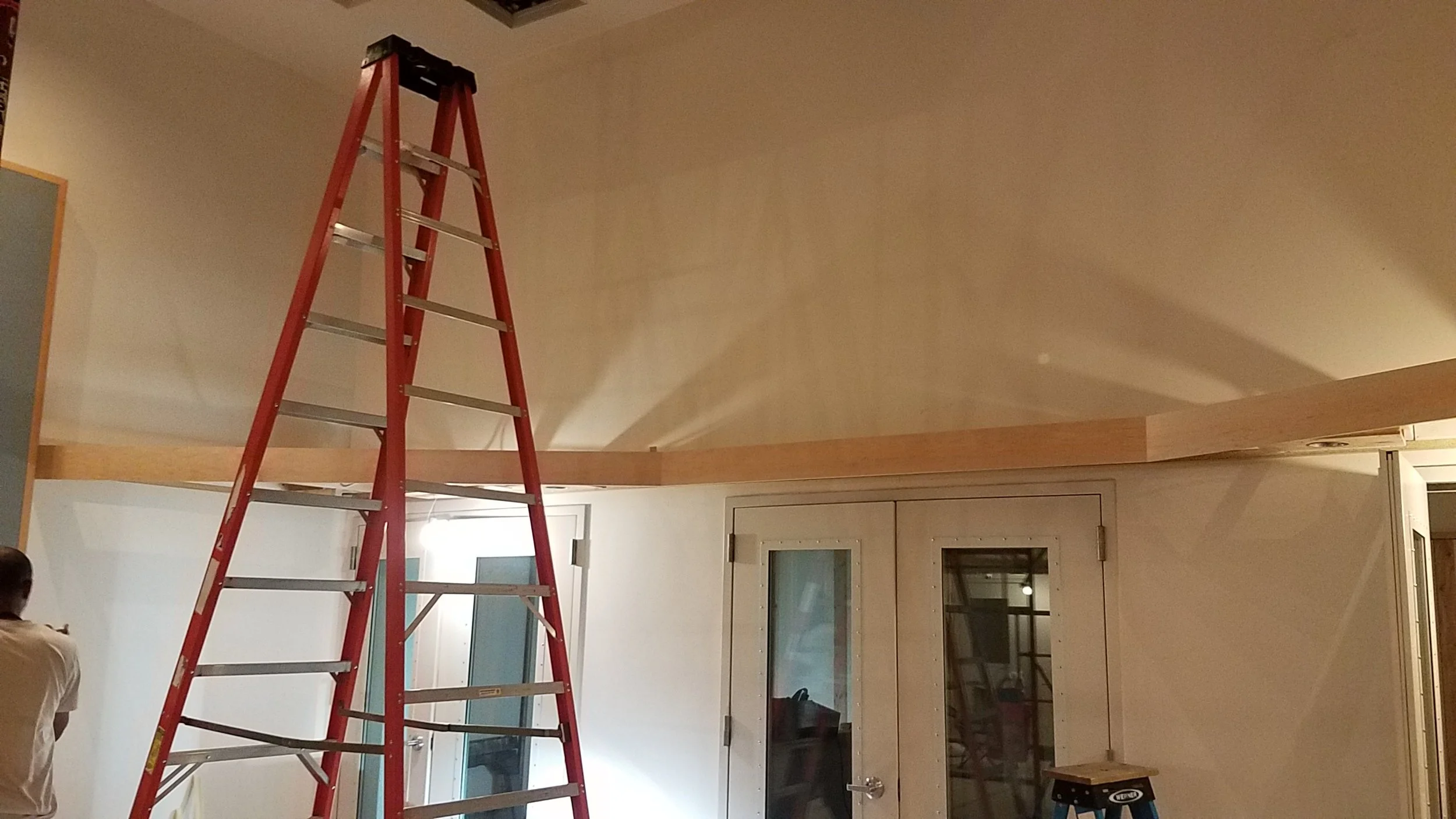 The soffits in tracking room 1 have their maple trim pieces now.