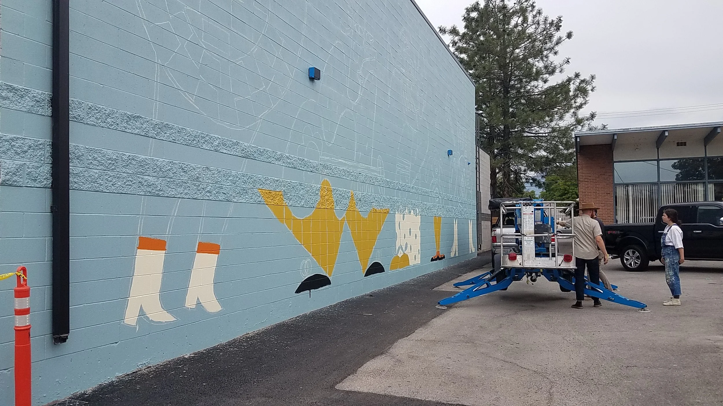Work on the mural continues.