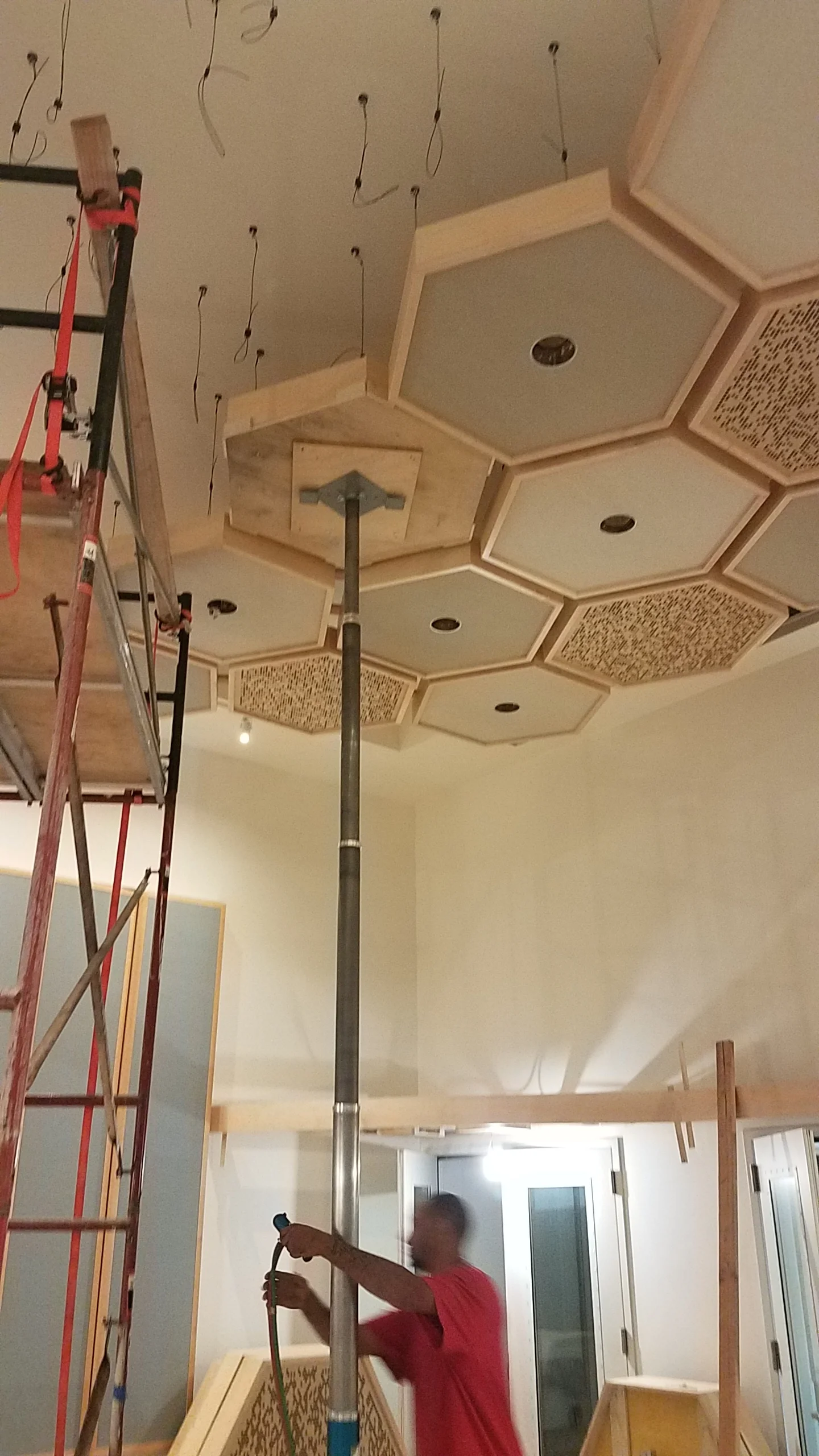 Tony Brett told me that this Genie lift was a real game changer when they found it. CO2 or compressed air powers the lift and helps hold each cloud while it is leveled and hung.