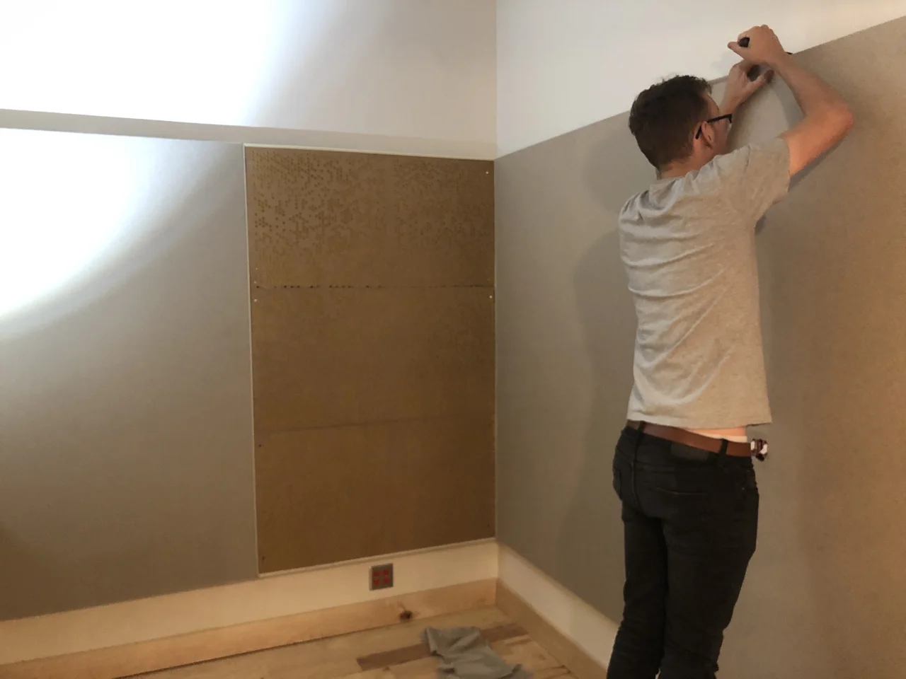 Fabric going up in one of the studio 1 isolation booths.