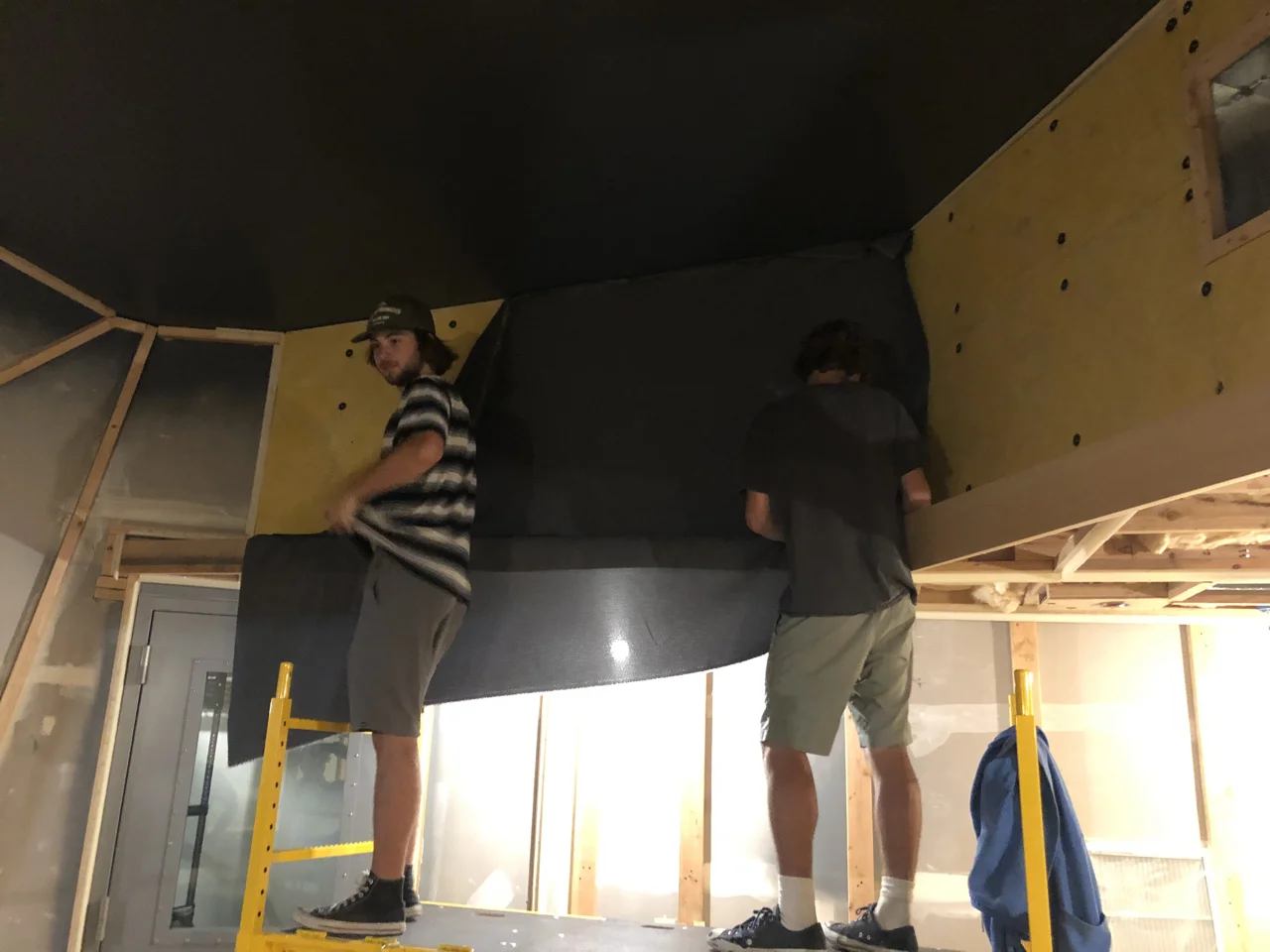 Fabric going up on the control room 2 soffit returns.