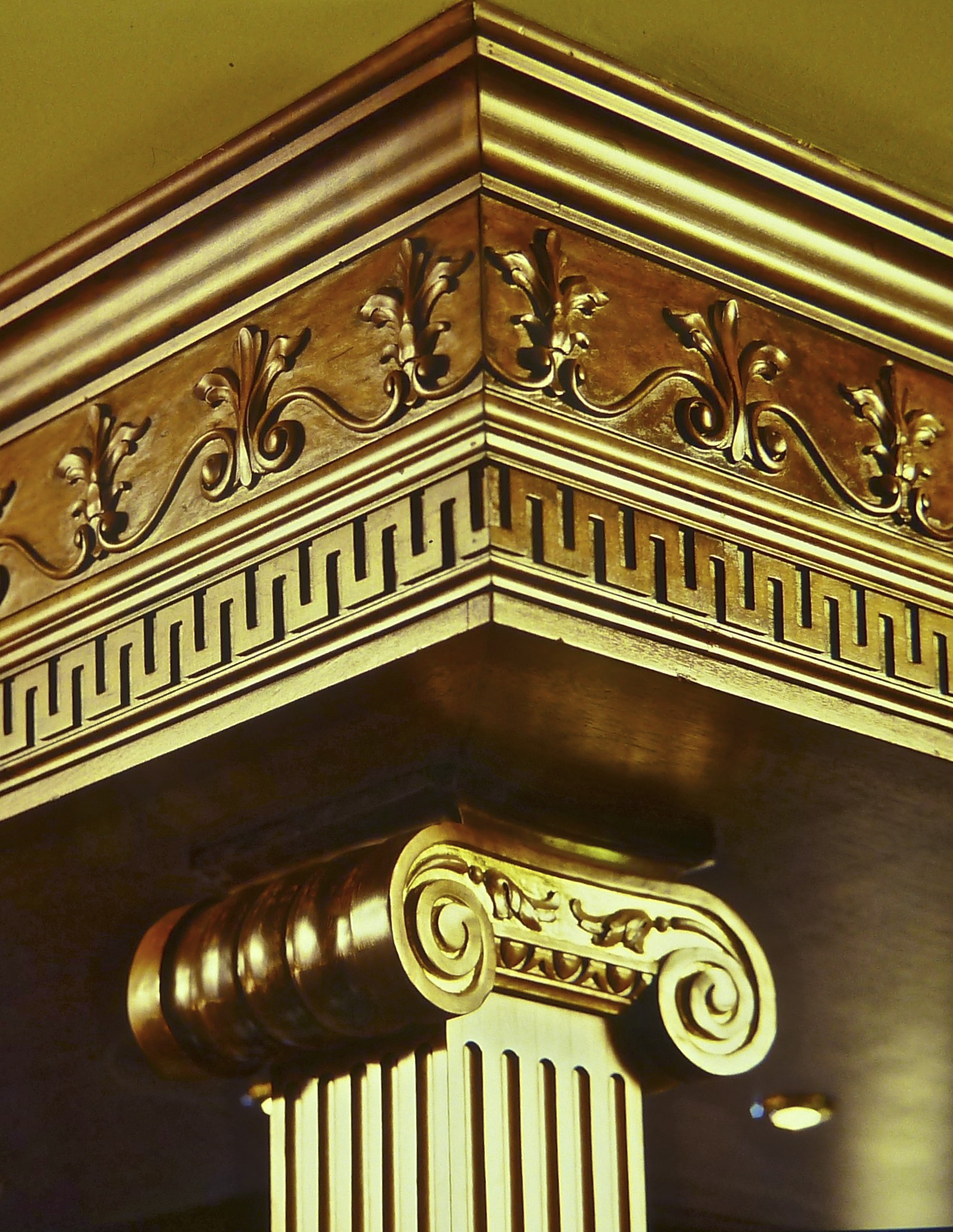Detailed view of a mahogany column for a custom-designed bar.