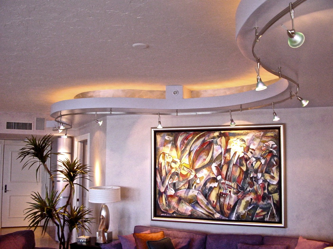 This condominium remodel has a contemporary edge with built out soffits and lighting.