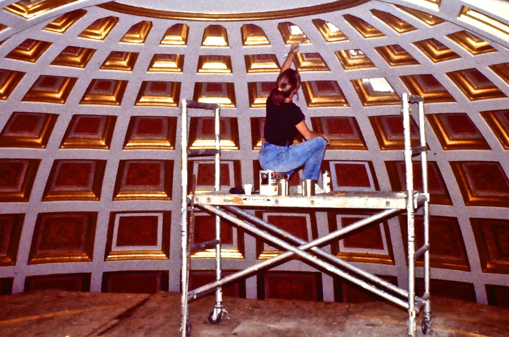 Alene Pettus restoring the stencil of the altar in St. Patrick's Cathedral in Boston.