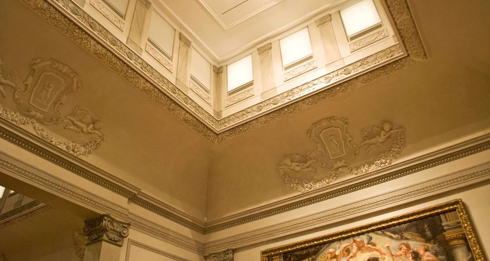 Close-up of the restored glazed faux finished frieze and marbled pillasters at the Ringling Museum of Art.
