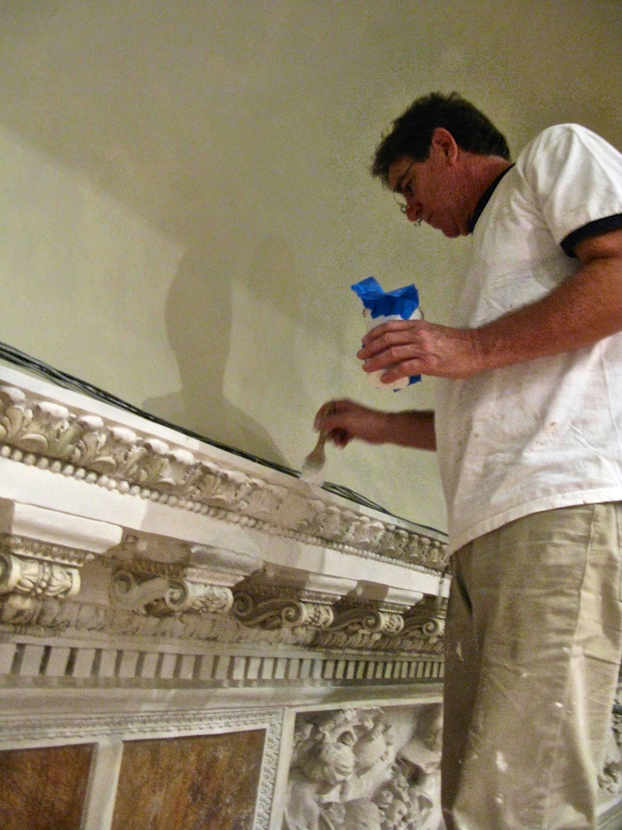 Jonathan Pettus restoring plaster work at The John and Mable Ringling Museum of Art.