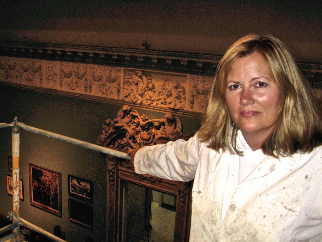 Alene Pettus on a scaffold at the John and Mable Ringling Museum of Art.