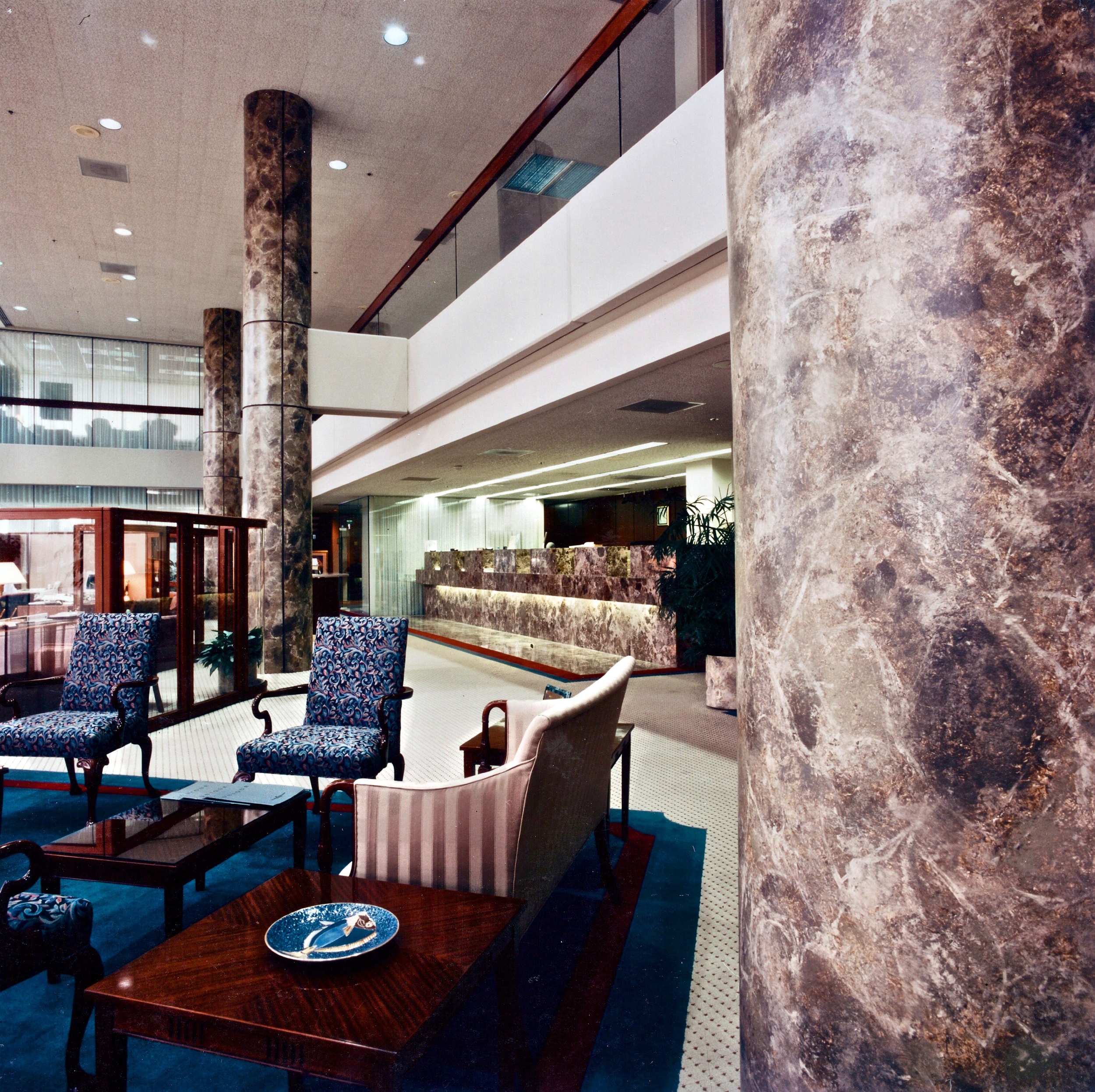 Cement columns in a bank were marbled to match existing stone floors and counters.