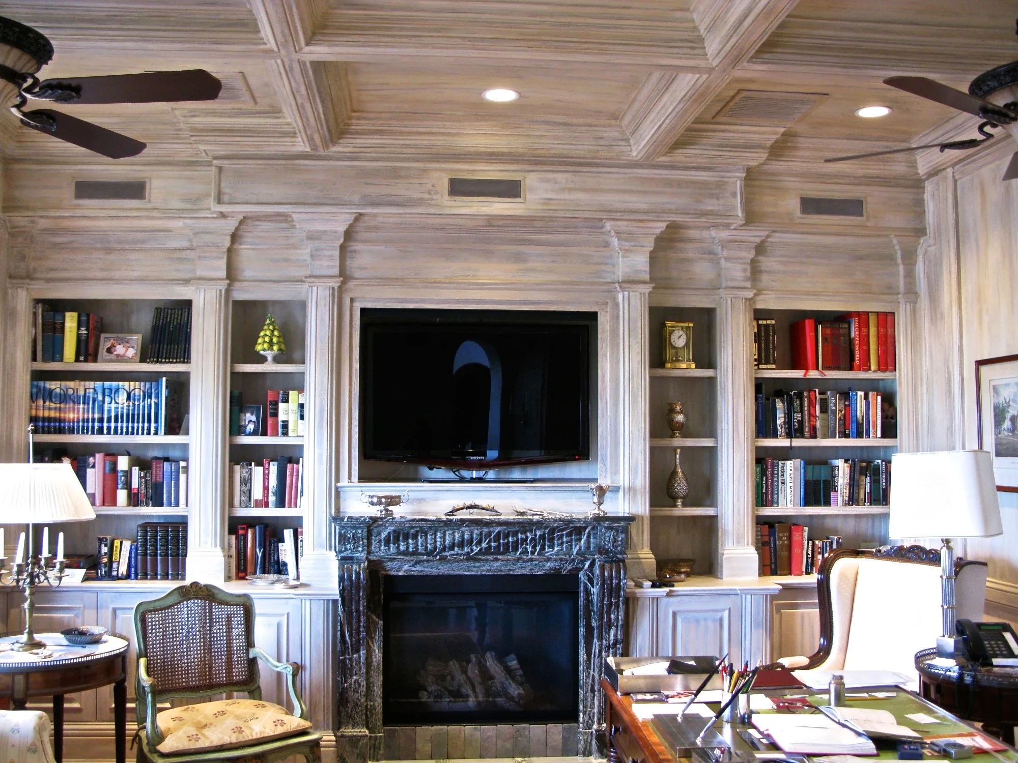 Library walls in a faux bois of sun-washed colors.