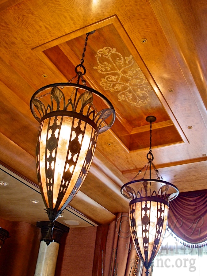 Venetian Plaster tray ceiling with a bas-relief stencil.