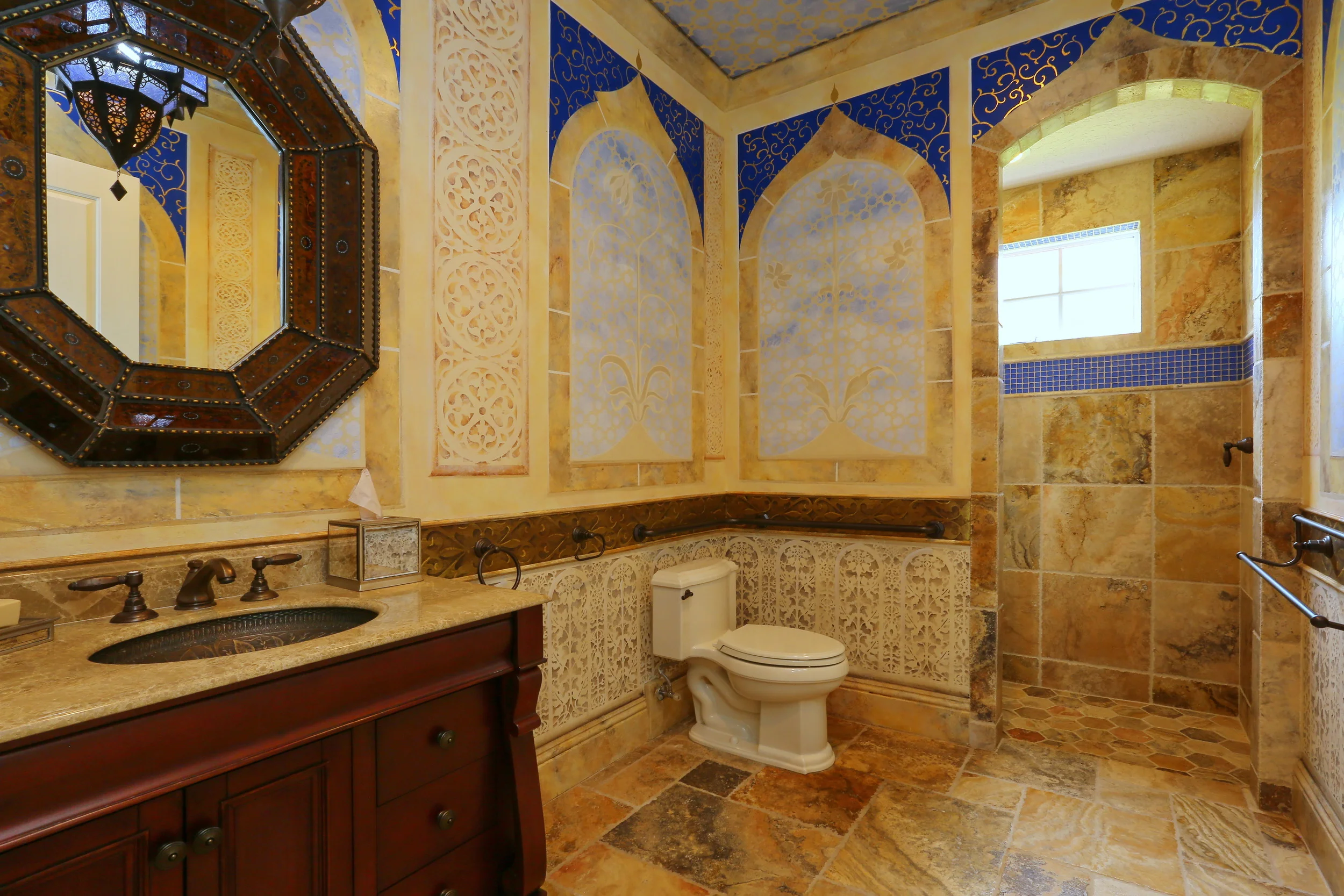 Hand-painted faux marble and Modello stencils used to create a bath inspired by Doris Duke's home Shangri La, a homage to Islamic art and architecture.
