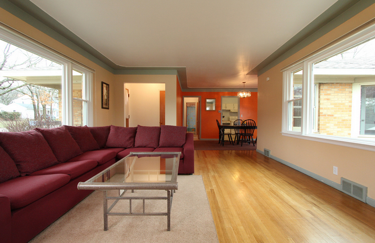 Living Room looking towards Dining/Kitchen/Hallway (Bedrooms + Bath)