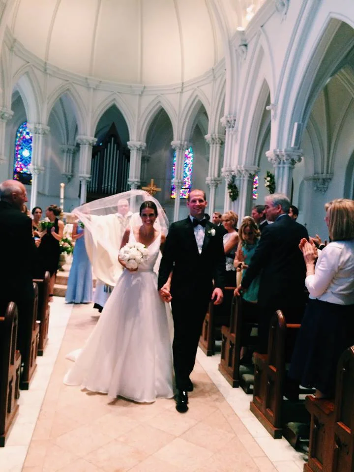 Elena & Pat priest holding veil.jpg