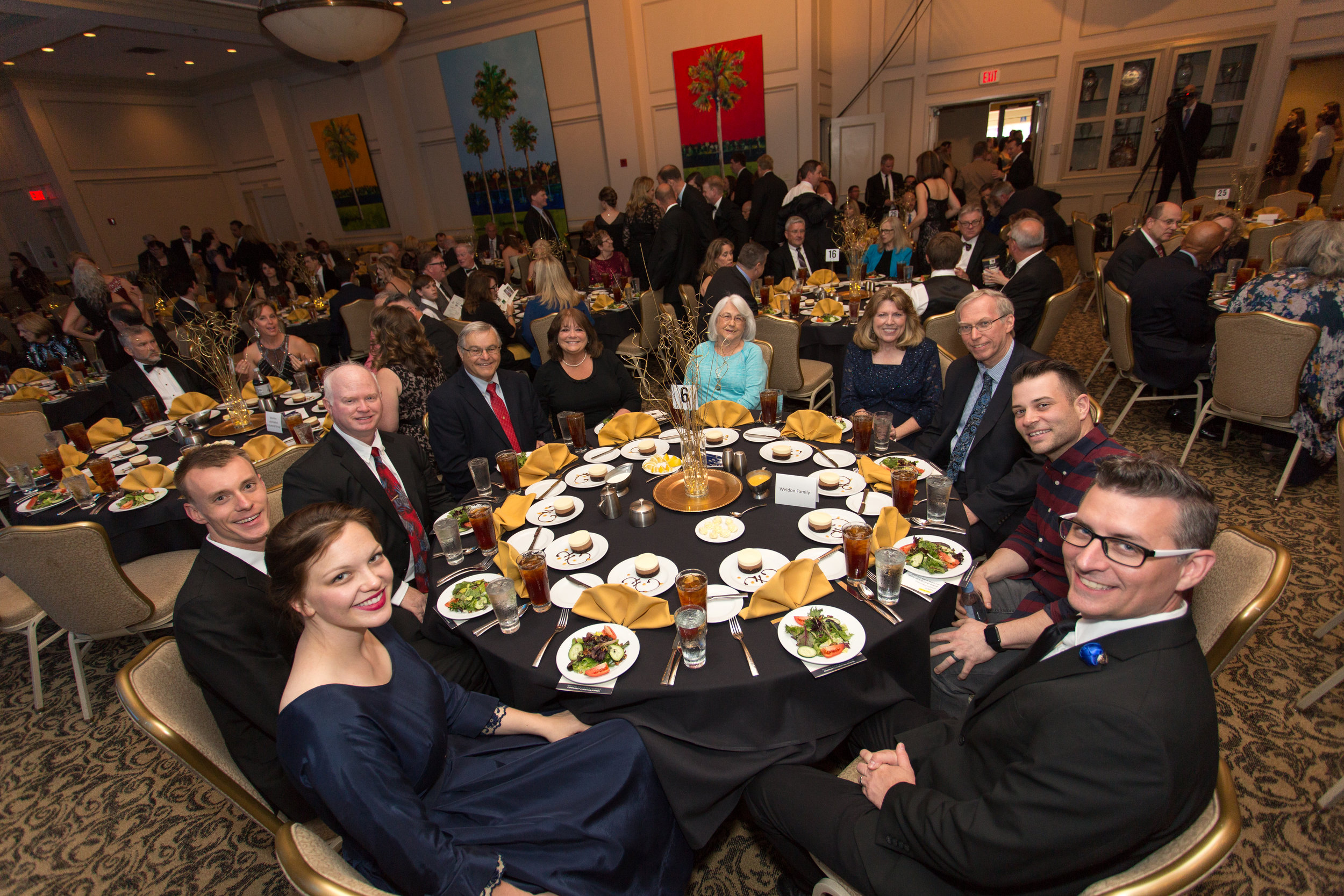 Singer Jonny Diaz hangs out with CCS faculty and friends, courtesy of table sponsors (and CCS grandparents) Bill and Diane Weldon.