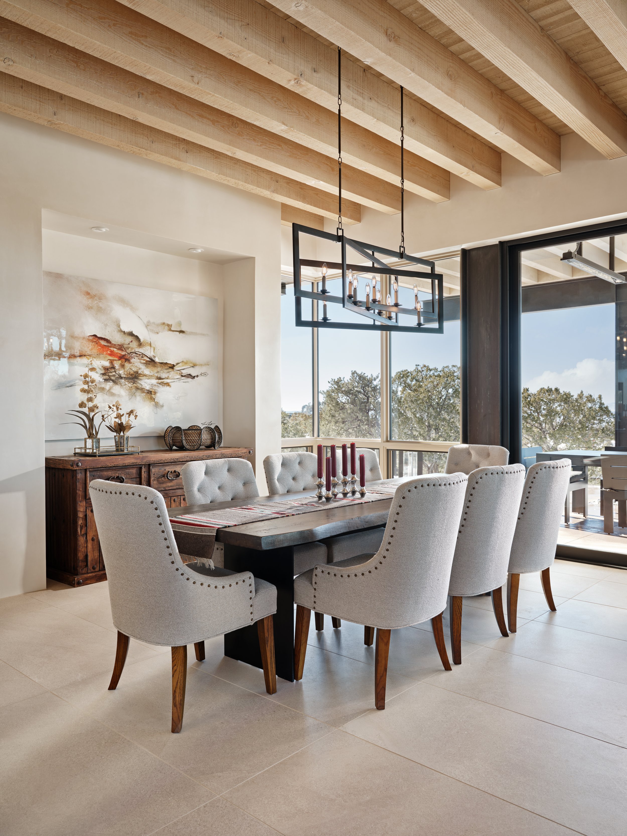 santa-fe-dining-room-with-metal-chandelier-and-large-wooden-table.jpg