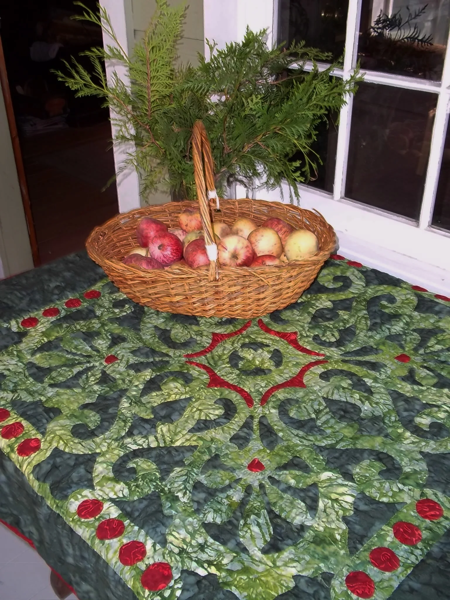 Christmas Berries , 42" x 42". Reverse applique and applique