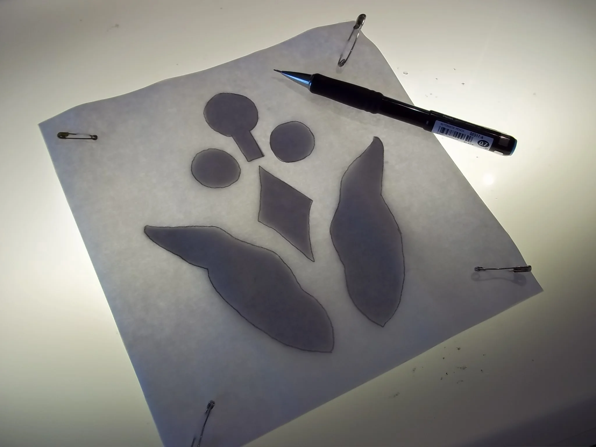 1. Trace pattern onto paper side of fusible webbing
