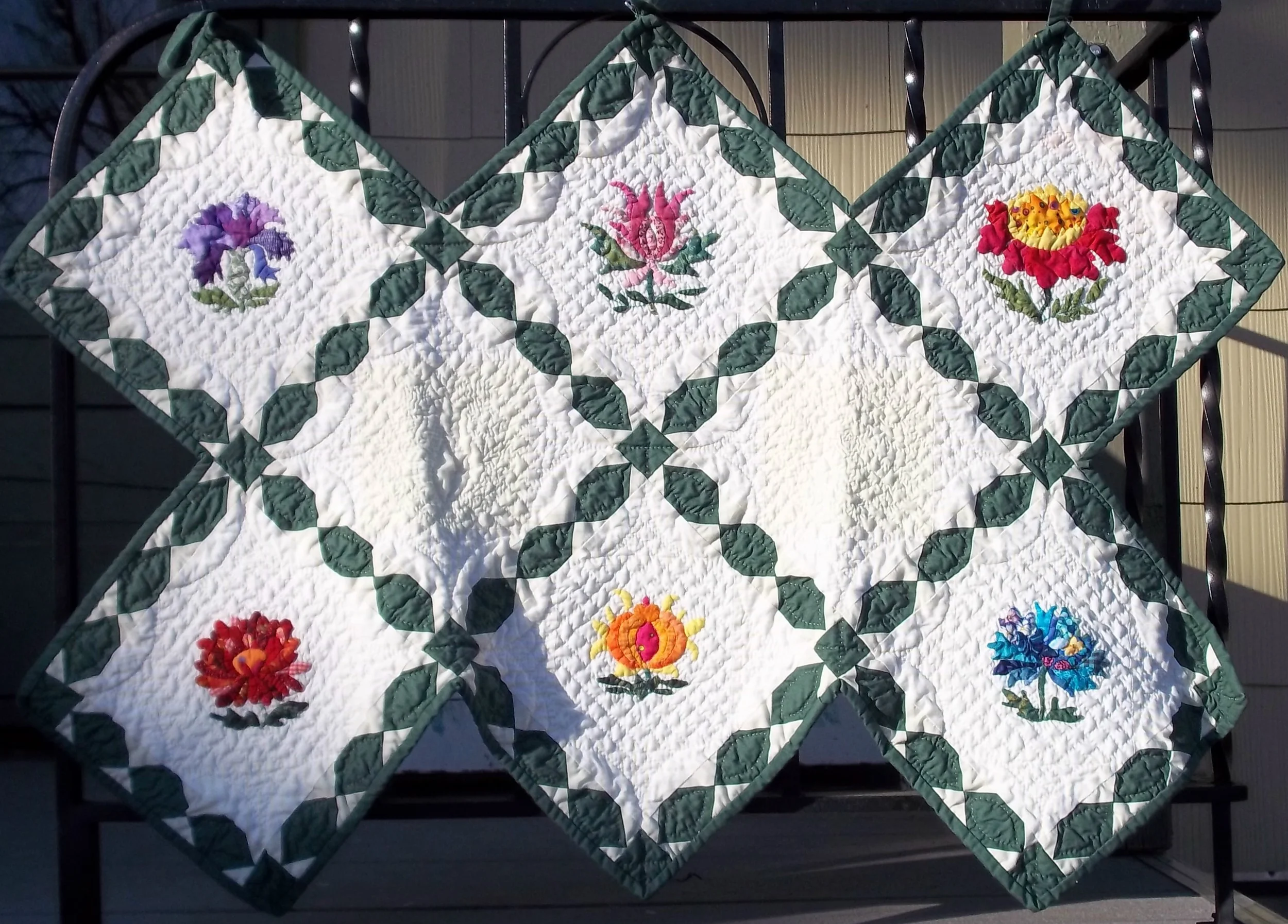 Summer Flowers. Hand applique, machine pieced, hand quilted.