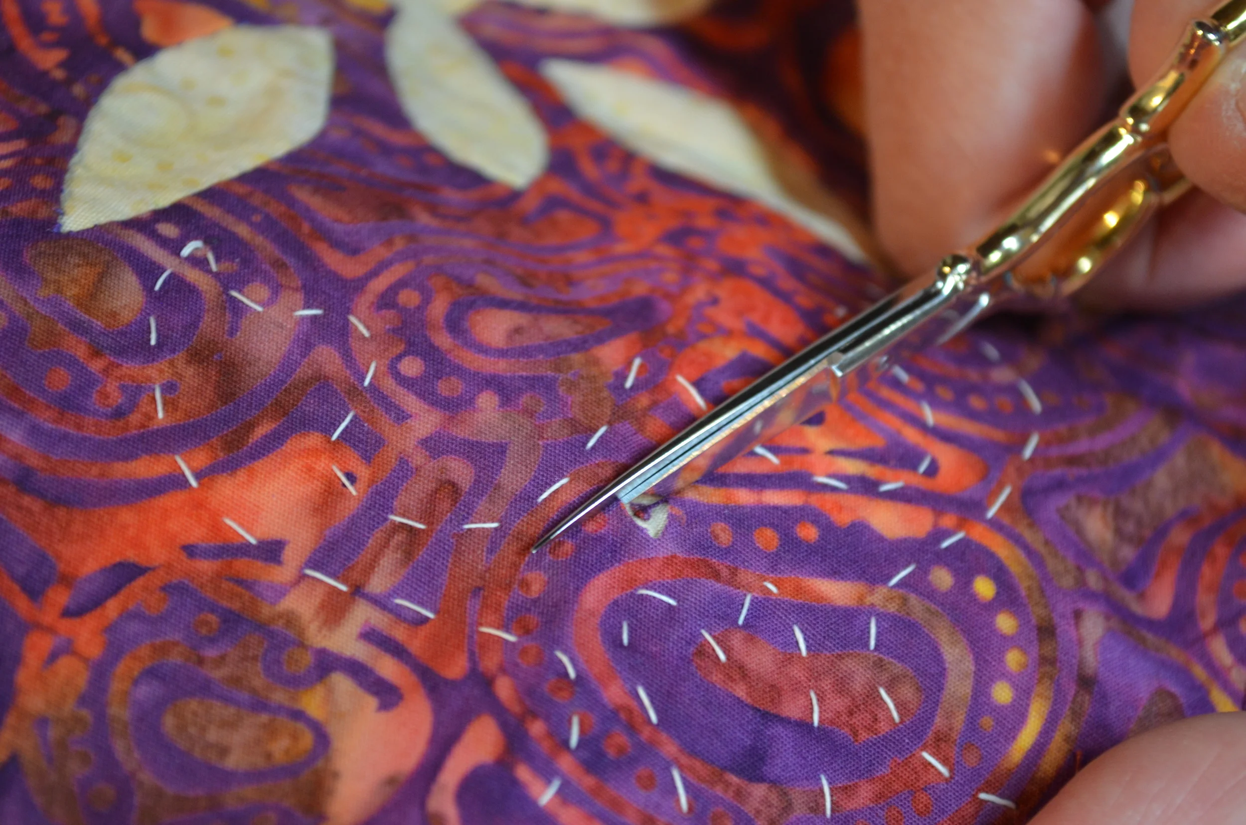 4. Sliding scissors between the layers.