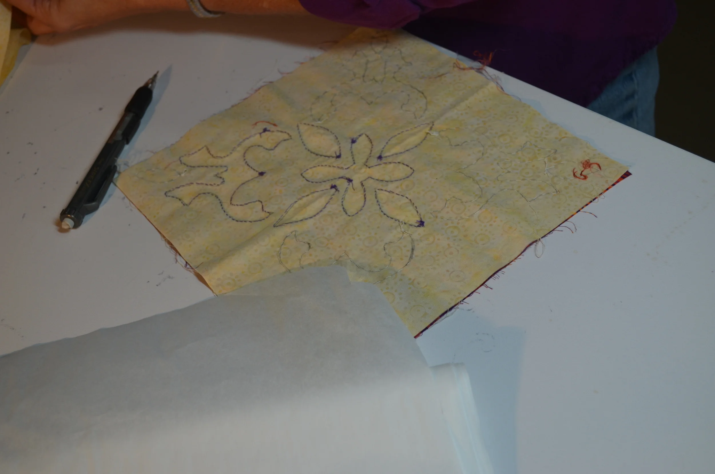 paper backed iron on fusible webbing, pencil and hurt piece.