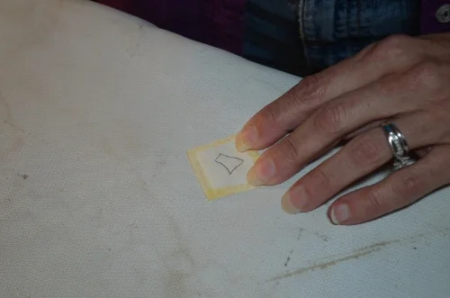 5. Fusible layered on right side of background .