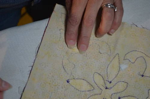 9. Position band-aid over the Boo-boo on the backside of your piece.