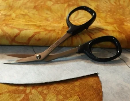 N5011S 4" bent handle Kai scissors . Very sharp for machine reverse applique.