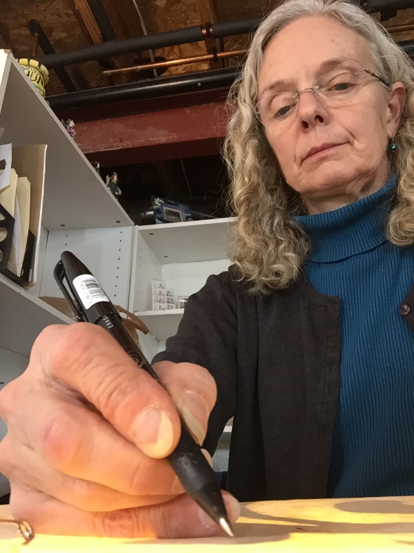 Designer Margaret Willingham tracing Majesty, Medallion IX.