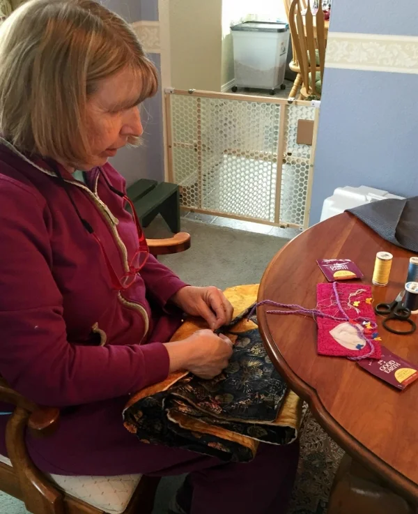 EOB Elf Ruth Ann stitching on binding.
