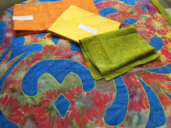 Auditioning binding fabrics.