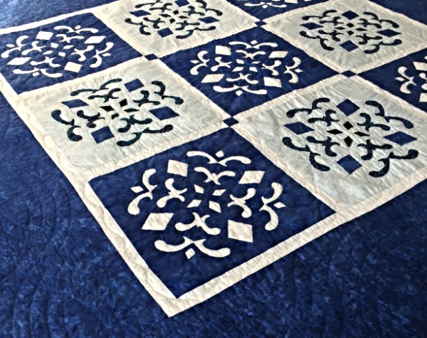 Double Dutch Delft , 56" x 56". 9 - 12" blocks: 5 Reverse applique, 4 applique