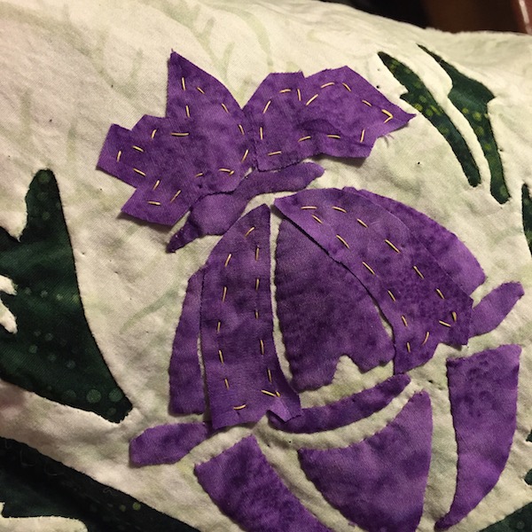 10. Some shapes sewn down, with others basted and ready to be stitched. 