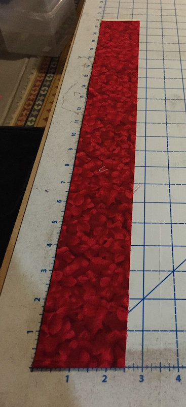 Binding strip cut 2.5" wide x WOF or LOF.