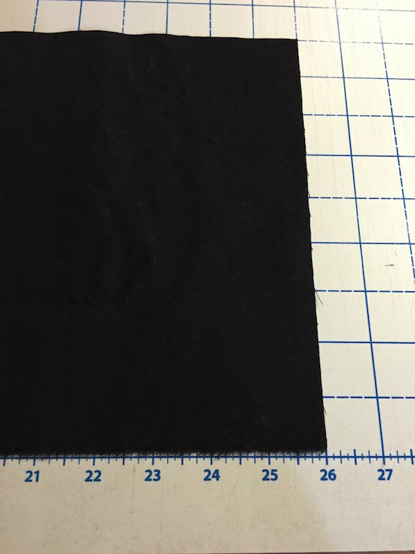 Cut sleeve fabric width of piece(26") by twice the sleeve depth (9").