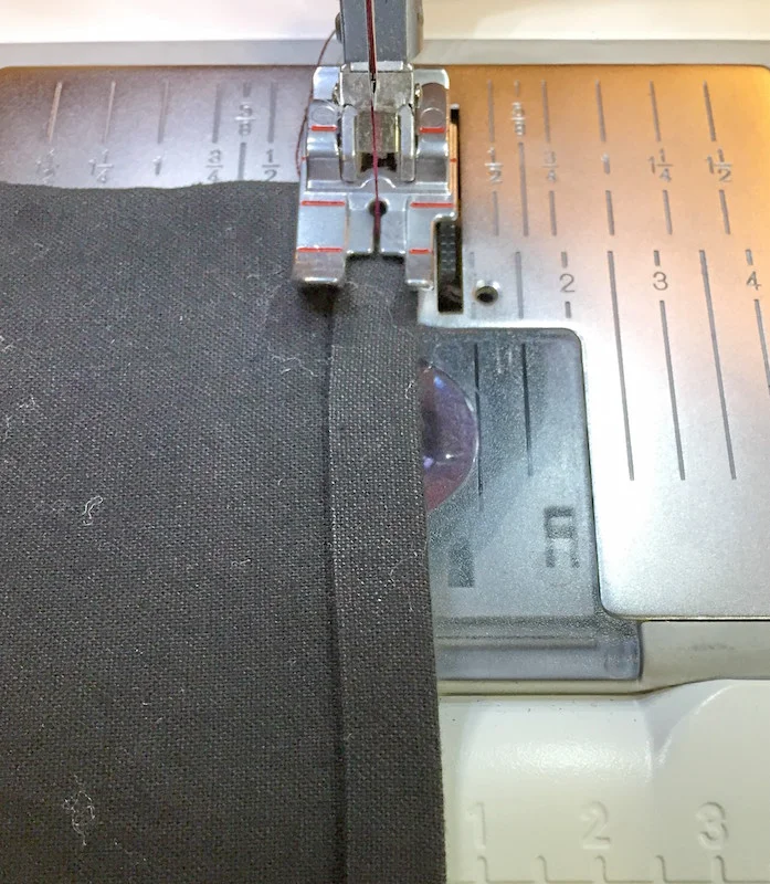 Sew in the middle of the fold to hem.