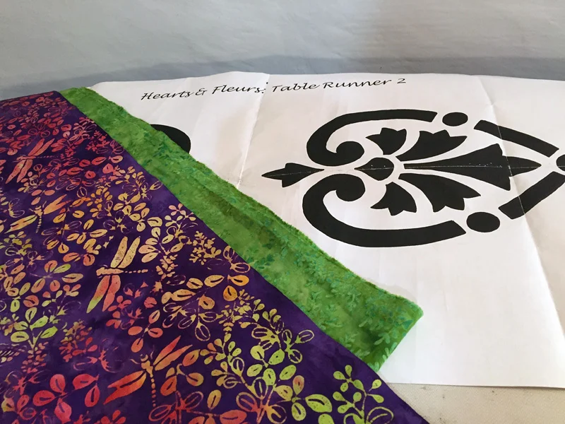 Hearts & Fleurs pattern with purple and green from Coral Reef collection by Island Batik.