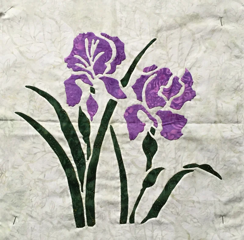 Iris, 9 of 9 (16" x 16"). Hand or machine reverse applique; hand applique and reverse applique for added dimension.