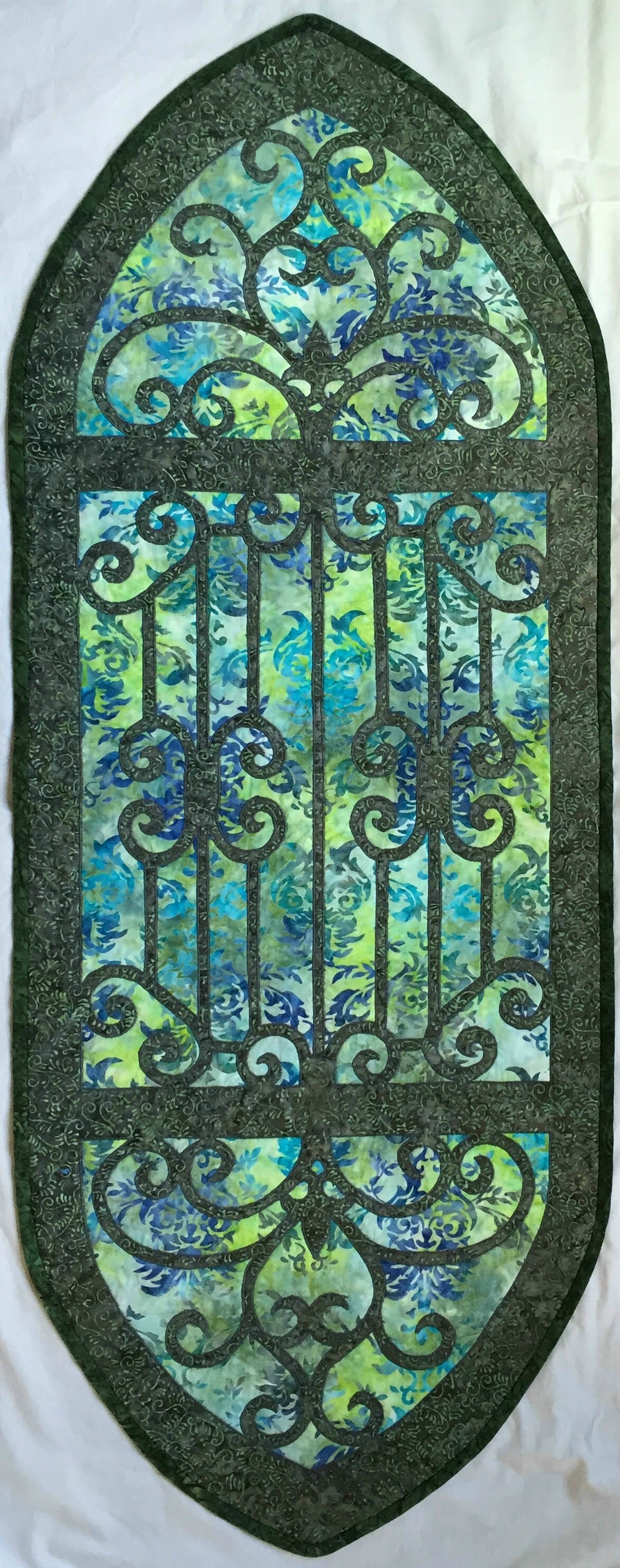 Karen's Hospitality (20" x 52.5"). hand and machine reverse applique