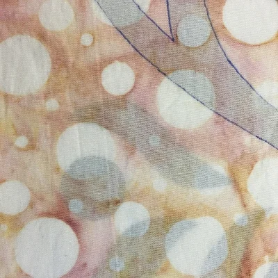 Seeing the pattern through fabric that is NOT pressed down with my free hand. No lightbox, either.