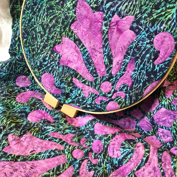 In my quilting hoop for added quilt texture.