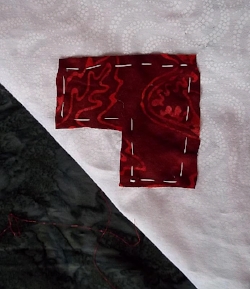 Pic. 3.Accent fabric basted around the edges.